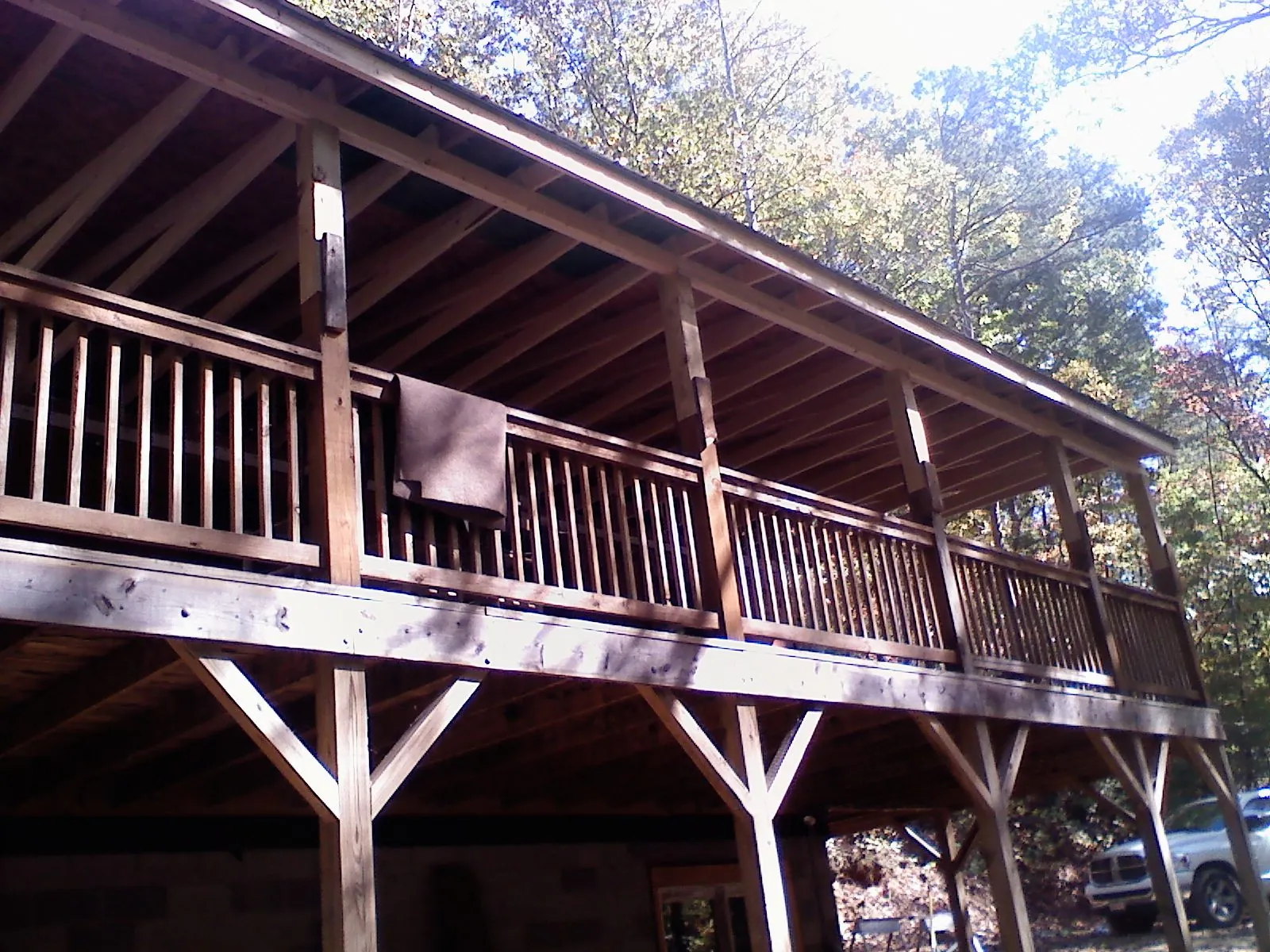 Timber framing under a new elevated porch and deck — Roof Leak Repair in Brownville by Roofing Brothers